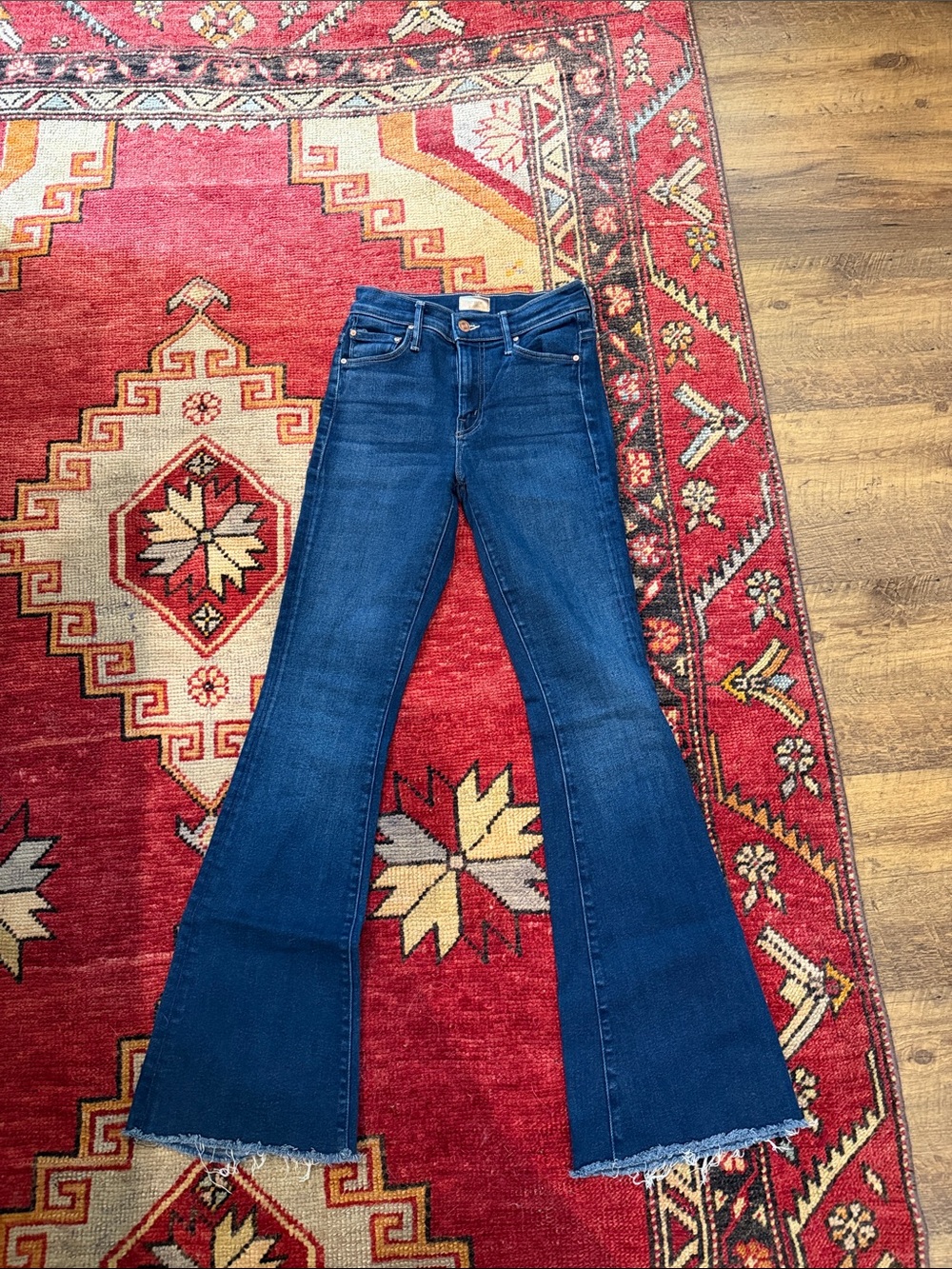MOTHER Dark Blue Flare Jeans with Raw Hem